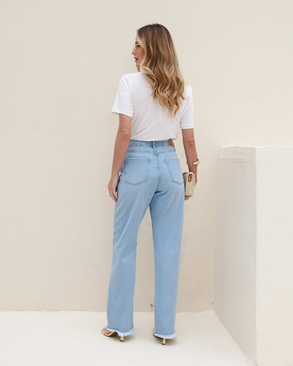 Reta jeans barra desfiada